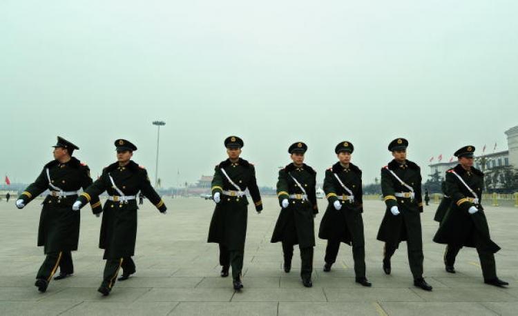 <a><img src="https://www.theepochtimes.com/assets/uploads/2015/09/97626946.jpg" alt="Chinese paramilitary police march in formation on Tiananmen Square, in Beijing, on March 11. (Frederic J. Brown/AFP/Getty Images)" title="Chinese paramilitary police march in formation on Tiananmen Square, in Beijing, on March 11. (Frederic J. Brown/AFP/Getty Images)" width="320" class="size-medium wp-image-1814681"/></a>