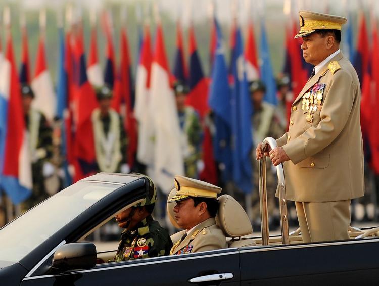 <a><img src="https://www.theepochtimes.com/assets/uploads/2015/09/98081795.jpg" alt="Burmese leader Than Shwe reviews troops during a military parade earlier this year. Nearly half of Burma's annual budget goes to the military while just over one percent of the budget is dedicated to health and education programs. (Christophe Archambault/AFP/Getty Images)" title="Burmese leader Than Shwe reviews troops during a military parade earlier this year. Nearly half of Burma's annual budget goes to the military while just over one percent of the budget is dedicated to health and education programs. (Christophe Archambault/AFP/Getty Images)" width="320" class="size-medium wp-image-1815116"/></a>