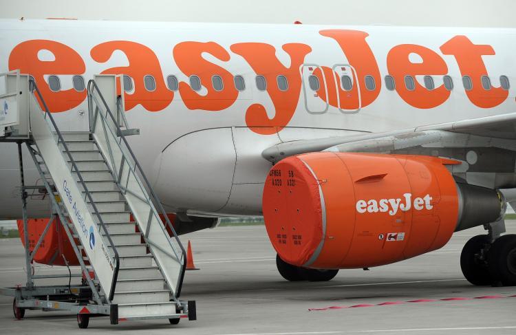 <a><img src="https://www.theepochtimes.com/assets/uploads/2015/09/98541364.jpg" alt="An EasyJet is pictured with its engines covered on April 19, 2010 following the closure of all UK airports due to ash from an Icelandic volcano. EasyJet is now trying to develop technology that could detect volcanic ash at high altitudes. (Paul Ellis/AFP/Getty Images)" title="An EasyJet is pictured with its engines covered on April 19, 2010 following the closure of all UK airports due to ash from an Icelandic volcano. EasyJet is now trying to develop technology that could detect volcanic ash at high altitudes. (Paul Ellis/AFP/Getty Images)" width="320" class="size-medium wp-image-1818998"/></a>