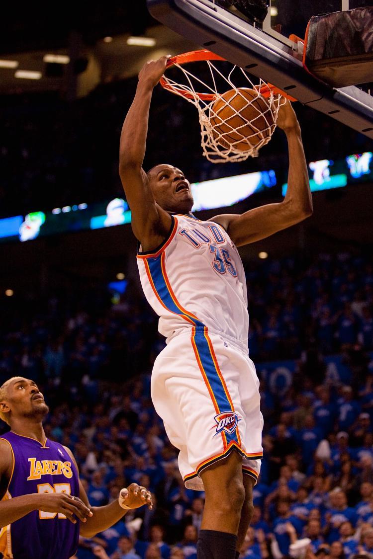 <a><img src="https://www.theepochtimes.com/assets/uploads/2015/09/98625989.jpg" alt="Kevin Durant of the Oklahoma City Thunder dunks the ball against Ron Artest of the Los Angeles Lakers during Game Three of the Western Conference Quarterfinals of the 2010 NBA Playoffs on April 22. (Dilip Vishwanat/Getty Images )" title="Kevin Durant of the Oklahoma City Thunder dunks the ball against Ron Artest of the Los Angeles Lakers during Game Three of the Western Conference Quarterfinals of the 2010 NBA Playoffs on April 22. (Dilip Vishwanat/Getty Images )" width="320" class="size-medium wp-image-1820582"/></a>