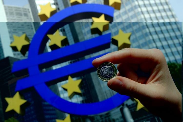 <a><img src="https://www.theepochtimes.com/assets/uploads/2015/09/98740454Euro.jpg" alt="A woman poses with a euro coin in front of the giant symbol of the EU's currency outside the European Central Bank's headquarters in Frankfurt, Germany, on April 29. The euro has slipped in recent weeks against the U.S. dollar due to Europe's sovereign debt woes.(Thomas Lohnes/AFP/Getty Images )" title="A woman poses with a euro coin in front of the giant symbol of the EU's currency outside the European Central Bank's headquarters in Frankfurt, Germany, on April 29. The euro has slipped in recent weeks against the U.S. dollar due to Europe's sovereign debt woes.(Thomas Lohnes/AFP/Getty Images )" width="320" class="size-medium wp-image-1820100"/></a>