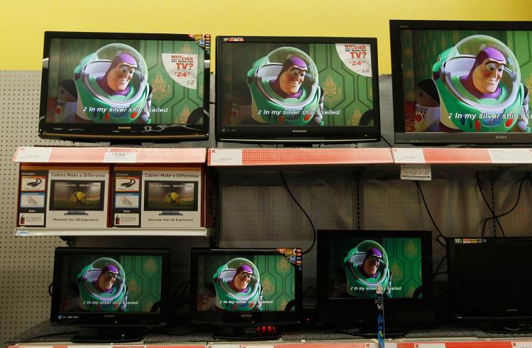 <a><img src="https://www.theepochtimes.com/assets/uploads/2015/09/98770144.jpg" alt="PURSUING STUFF: Flat screen televisions for sale are seen at a retail store April 30 in New York.  (Chris Hondros/Getty Images)" title="PURSUING STUFF: Flat screen televisions for sale are seen at a retail store April 30 in New York.  (Chris Hondros/Getty Images)" width="320" class="size-medium wp-image-1820368"/></a>