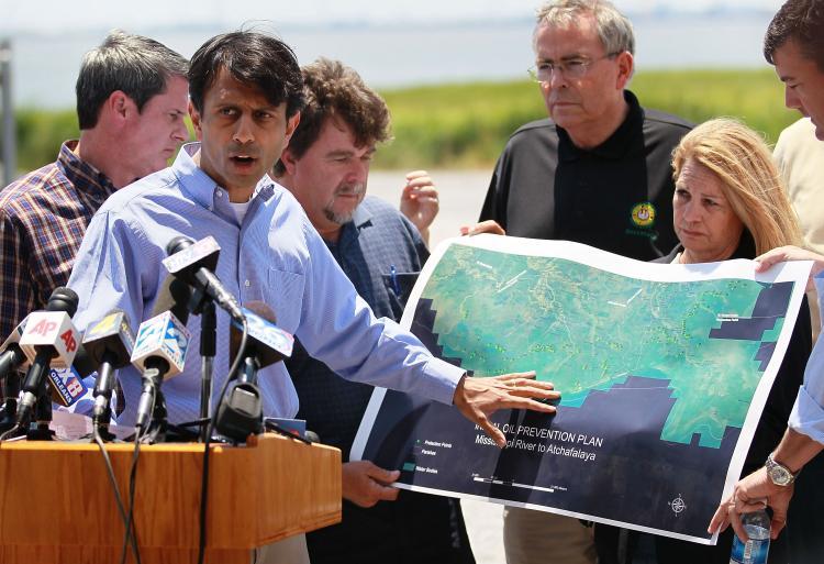 <a><img src="https://www.theepochtimes.com/assets/uploads/2015/09/98956135.jpg" alt="Oil Spill: Louisiana Governor Bobby Jindal points to a map showing the areas that might be affected by BP's massive oil spill as he meets with the media on May 10, in Lafourche Parish, Louisiana. (Joe Raedle/Getty Images)" title="Oil Spill: Louisiana Governor Bobby Jindal points to a map showing the areas that might be affected by BP's massive oil spill as he meets with the media on May 10, in Lafourche Parish, Louisiana. (Joe Raedle/Getty Images)" width="320" class="size-medium wp-image-1820046"/></a>