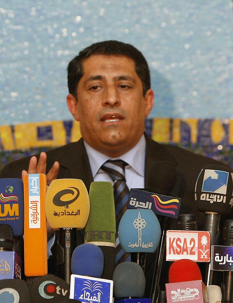 <a><img src="https://www.theepochtimes.com/assets/uploads/2015/09/99596840_Iraq_recount.jpg" alt="Qassim al-Abbudi, spokesman for Iraq's Independent High Electoral Commission (IHEC), speaks during a press conference in Baghdad on May 16. Iraqi Prime Minister Nuri al-Maliki failed to gain the four seats he needed to form a coalition government. (Ahmad Al-Rubaye/Getty Images )" title="Qassim al-Abbudi, spokesman for Iraq's Independent High Electoral Commission (IHEC), speaks during a press conference in Baghdad on May 16. Iraqi Prime Minister Nuri al-Maliki failed to gain the four seats he needed to form a coalition government. (Ahmad Al-Rubaye/Getty Images )" width="320" class="size-medium wp-image-1819835"/></a>