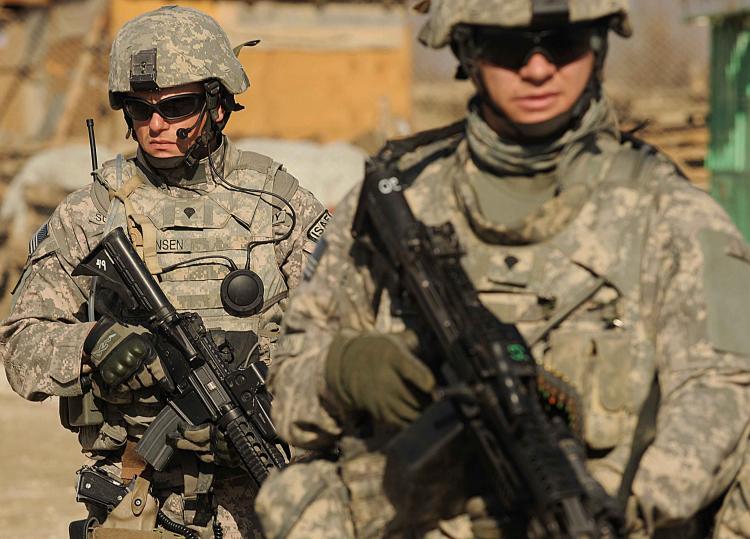 <a><img src="https://www.theepochtimes.com/assets/uploads/2015/09/Afghanistan84119819-1.jpg" alt="RAMPING UP: US soldiers belonging to the NATO-led International Security Assistance Force (ISAF) walk during a patrol in a village in Iraq on Dec. 24. (Shah Marai/AFP/Getty Images )" title="RAMPING UP: US soldiers belonging to the NATO-led International Security Assistance Force (ISAF) walk during a patrol in a village in Iraq on Dec. 24. (Shah Marai/AFP/Getty Images )" width="320" class="size-medium wp-image-1831523"/></a>