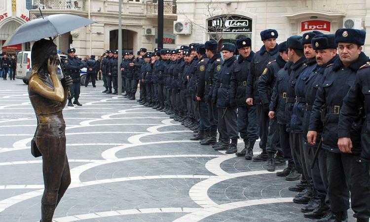 <a><img src="https://www.theepochtimes.com/assets/uploads/2015/09/Azerbaijani-110024978.jpg" alt="LINED UP: Azerbaijani police officers stand in front of a sculpture as they cordon off the area of an anti-government protest in central Baku, on March 12.  (STR/AFP/Getty Images)" title="LINED UP: Azerbaijani police officers stand in front of a sculpture as they cordon off the area of an anti-government protest in central Baku, on March 12.  (STR/AFP/Getty Images)" width="320" class="size-medium wp-image-1806789"/></a>