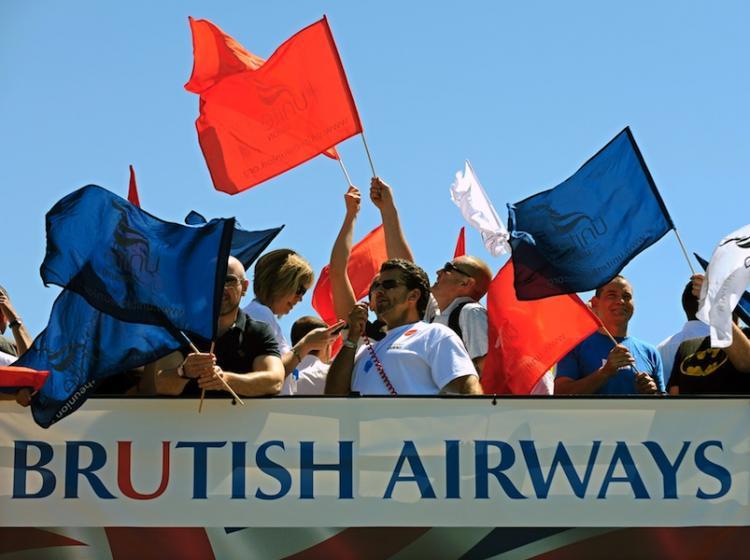 <a><img src="https://www.theepochtimes.com/assets/uploads/2015/09/BA-100367577.jpg" alt="Union members set off on a double-decker bus to take part in a protest in supporting British Airways cabin crew during the first day of a five-day strike at Heathrow Airport on May 24. (Adrian Dennis/AFP/Getty Images )" title="Union members set off on a double-decker bus to take part in a protest in supporting British Airways cabin crew during the first day of a five-day strike at Heathrow Airport on May 24. (Adrian Dennis/AFP/Getty Images )" width="320" class="size-medium wp-image-1819529"/></a>