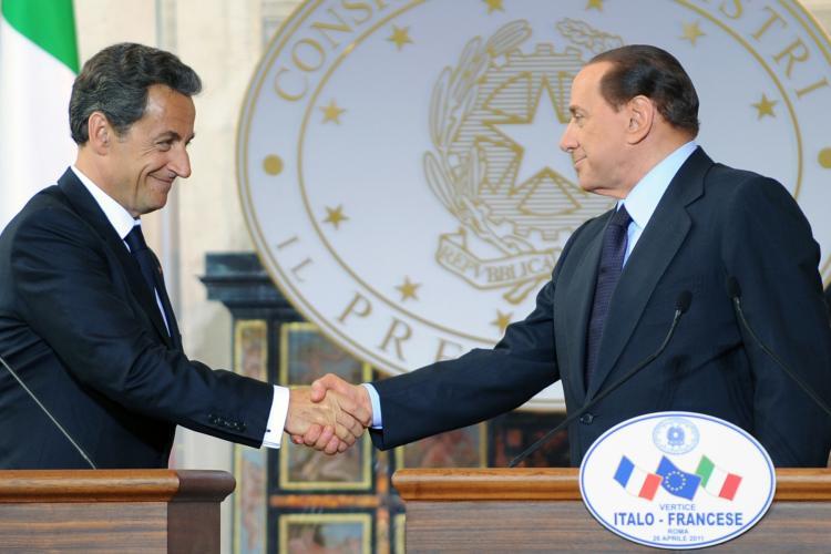 <a><img src="https://www.theepochtimes.com/assets/uploads/2015/09/BORDER-113176867.jpg" alt="COMMON CAUSE: French President Nicolas Sarkozy and Italian Prime Minister Silvio Berlusconi (R) shake hands at the end of a summit on April 26 in Rome. The two leaders are spearheading a call to allow EU member states to reimpose internal border controls more easily. (Andreas Solaro/Getty Images )" title="COMMON CAUSE: French President Nicolas Sarkozy and Italian Prime Minister Silvio Berlusconi (R) shake hands at the end of a summit on April 26 in Rome. The two leaders are spearheading a call to allow EU member states to reimpose internal border controls more easily. (Andreas Solaro/Getty Images )" width="320" class="size-medium wp-image-1804416"/></a>