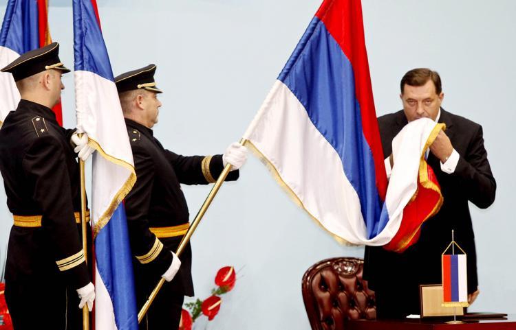 <a><img src="https://www.theepochtimes.com/assets/uploads/2015/09/BOSNIA-107069414-COLOR.jpg" alt="President of the Republika Srpska, Milorad Dodik, kisses the Bosnian Serb flag at his inauguration ceremony in November 2010. A referendum planned by Dodik that could further see the country split, was called off after international intervention. (Milan Radulovic/AFP/Getty Images)" title="President of the Republika Srpska, Milorad Dodik, kisses the Bosnian Serb flag at his inauguration ceremony in November 2010. A referendum planned by Dodik that could further see the country split, was called off after international intervention. (Milan Radulovic/AFP/Getty Images)" width="320" class="size-medium wp-image-1804023"/></a>