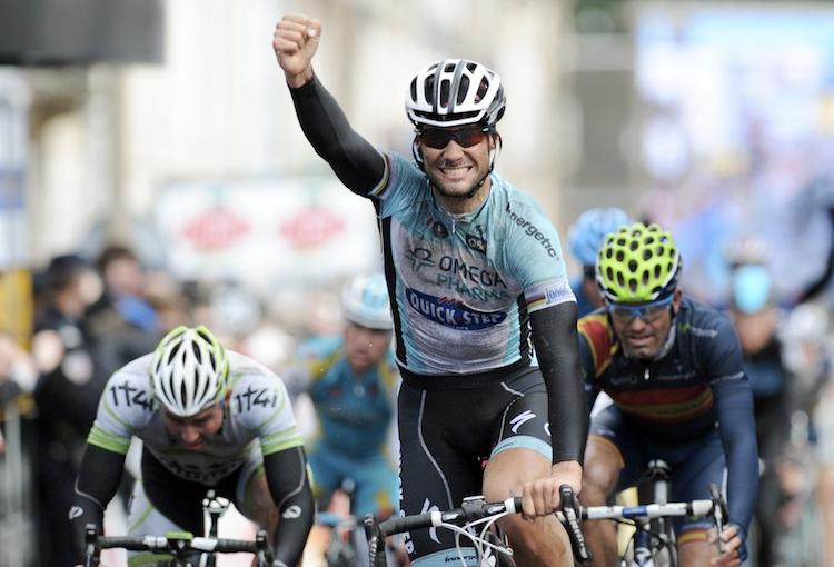 <a><img class="size-large wp-image-1791001" title="Belgium's Tom Boonen (C) celebrates on t" src="https://www.theepochtimes.com/assets/uploads/2015/09/BoonenTwo140712666.jpg" alt="Belgium's Tom Boonen (C) celebrates on t" width="354" height="241"/></a>