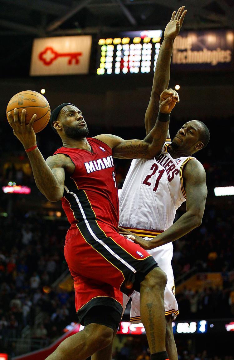 <a><img src="https://www.theepochtimes.com/assets/uploads/2015/09/BreLon111101780Web.jpg" alt="LeBron James #6 of the Miami Heat drives to the basket during the game against J. J. Hickson #21 of the Cleveland Cavaliers on March 29, 2011. (Jared Wickerham/Getty Images)" title="LeBron James #6 of the Miami Heat drives to the basket during the game against J. J. Hickson #21 of the Cleveland Cavaliers on March 29, 2011. (Jared Wickerham/Getty Images)" width="320" class="size-medium wp-image-1806222"/></a>
