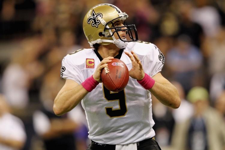 <a><img src="https://www.theepochtimes.com/assets/uploads/2015/09/Brees130151912.jpg" alt="Saints quarterback Drew Brees (pictured) was 31/35 passing for 325 yards and 5 touchdowns against the Colts Sunday. (Jamie Squire/Getty Images)" title="Saints quarterback Drew Brees (pictured) was 31/35 passing for 325 yards and 5 touchdowns against the Colts Sunday. (Jamie Squire/Getty Images)" width="575" class="size-medium wp-image-1795897"/></a>