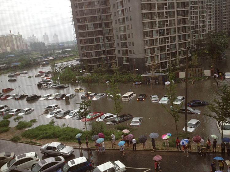 <a><img class="size-medium wp-image-1784209" title="Beijing flooding, the worst in six decades, on July 21" src="https://www.theepochtimes.com/assets/uploads/2015/09/CFP430137725.jpg" alt="Beijing flooding, the worst in six decades, on July 21" width="350" height="262"/></a>
