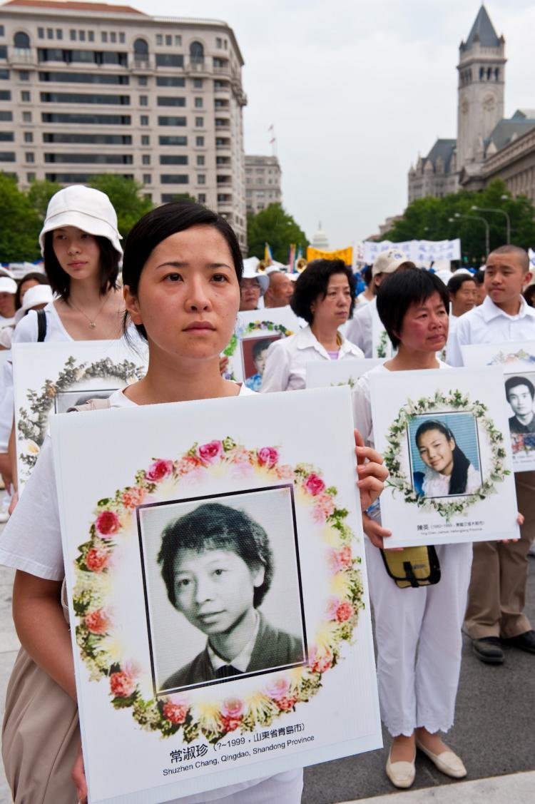 <a><img src="https://www.theepochtimes.com/assets/uploads/2015/09/CHINA-PROPAGANDA-WEB.jpg" alt="Falun Gong practitioners carry photos of fellow practitioners killed in the persecution against Falun Gong in China, in a parade in Washington, D.C., in July 2009. After the Chinese Communist Party launched a heavy anti-Falun Gong propaganda campaign in 2001, starting with a staged self-immolation in Tiananmen Square, the number of murdered practitioners dramatically increased. (Dai Bing/ Epoch Times )" title="Falun Gong practitioners carry photos of fellow practitioners killed in the persecution against Falun Gong in China, in a parade in Washington, D.C., in July 2009. After the Chinese Communist Party launched a heavy anti-Falun Gong propaganda campaign in 2001, starting with a staged self-immolation in Tiananmen Square, the number of murdered practitioners dramatically increased. (Dai Bing/ Epoch Times )" width="320" class="size-medium wp-image-1809235"/></a>