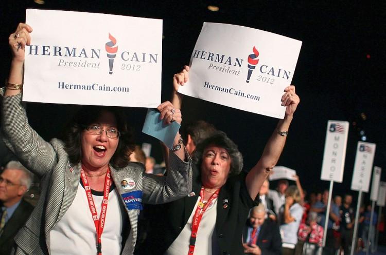 <a><img src="https://www.theepochtimes.com/assets/uploads/2015/09/Cain_126309887.jpg" alt="Herman Cain supporters Adelaida Rosario (L), and Mercedes Sabina (R) react to the announcement of Republican presidential candidate Herman Cain winning Florida's straw poll at the Florida Presidency 5 convention at the Orange County Convention Center, Sept. 24, in Orlando, Fla. Herman Cain won Florida's straw poll with 37.11 percent of the vote. (Mark Wilson/Getty Images)" title="Herman Cain supporters Adelaida Rosario (L), and Mercedes Sabina (R) react to the announcement of Republican presidential candidate Herman Cain winning Florida's straw poll at the Florida Presidency 5 convention at the Orange County Convention Center, Sept. 24, in Orlando, Fla. Herman Cain won Florida's straw poll with 37.11 percent of the vote. (Mark Wilson/Getty Images)" width="320" class="size-medium wp-image-1797274"/></a>