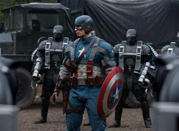 DANGEROUS COMPANY: Captain America (Chris Evans, center), surrounded by Hydra Soldiers in the action-adventure movie 'Captain America: The First Avenger.' (Courtesy of Jay Maidment / Marvel Studios)
