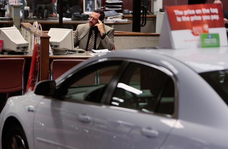 <a><img src="https://www.theepochtimes.com/assets/uploads/2015/09/CarDealer_83743084.jpg" alt="DEALER WOES: A car salesman works at his desk in a car showroom in New York City. U.S. automakers announced the closure of 988 dealerships in 2008. (Chris Hondros/Getty Images)" title="DEALER WOES: A car salesman works at his desk in a car showroom in New York City. U.S. automakers announced the closure of 988 dealerships in 2008. (Chris Hondros/Getty Images)" width="320" class="size-medium wp-image-1830989"/></a>