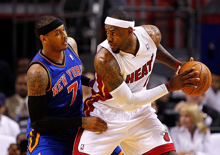 <a><img class="size-full wp-image-1788130" title="New York Knicks v Miami Heat - Game Two" src="https://www.theepochtimes.com/assets/uploads/2015/09/CarmeloLeBron143608572.jpg" alt="Carmelo Anthony (L) scored 30 points but it wasn't enough as LeBron James (R) and the Heat turned up their defense in the second half. (Mike Ehrmann/Getty Images)" width="750" height="529"/></a>