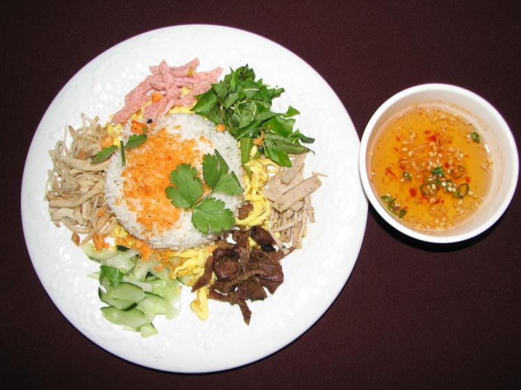 <a><img src="https://www.theepochtimes.com/assets/uploads/2015/09/ComAmPhu-1.jpg" alt="'HELL' RICE: The owners of the Saigon Cafe in Arlington, Virginia, dubbed this dish, 'Hell' Rice, also known in Vietnamese, as Com Am Phu, from the region of Hue, Vietnam. It's colorful rice dish with four kinds of pork. (Phuc Le)" title="'HELL' RICE: The owners of the Saigon Cafe in Arlington, Virginia, dubbed this dish, 'Hell' Rice, also known in Vietnamese, as Com Am Phu, from the region of Hue, Vietnam. It's colorful rice dish with four kinds of pork. (Phuc Le)" width="320" class="size-medium wp-image-1825017"/></a>