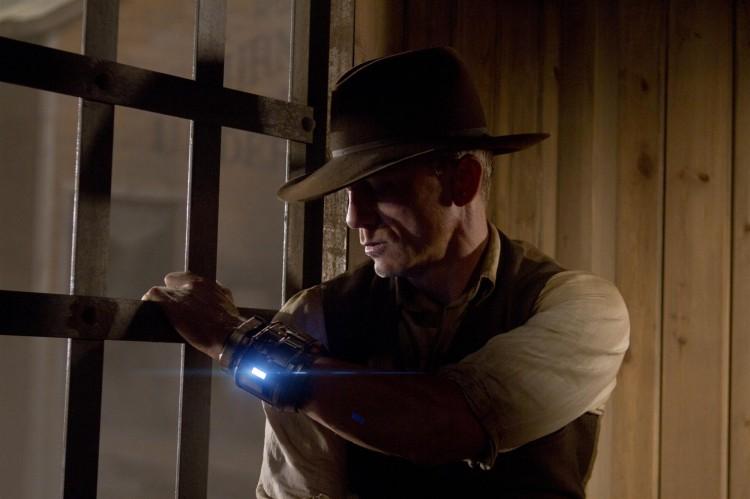 BEHIND BARS: Daniel Craig as a stranger with no memory of his past, in the action sci-fi thriller 'Cowboys & Aliens.' (Zade Rosenthal/Universal Studios and DreamWorks II Distribution Co. LLC)
