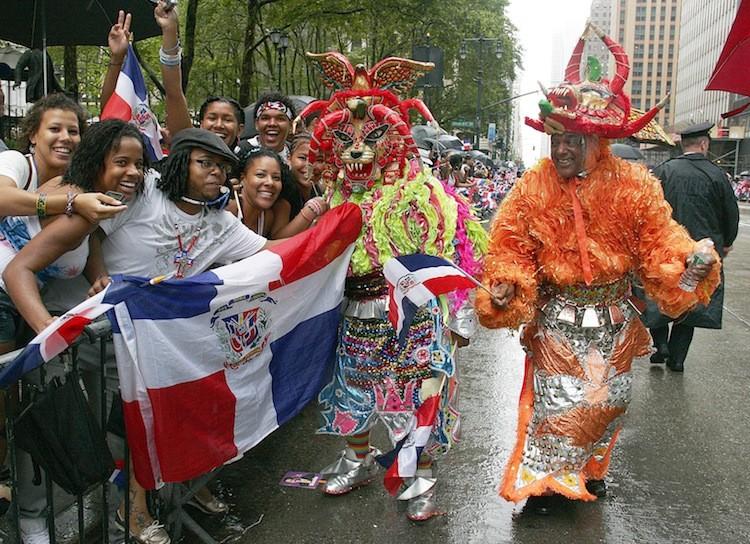 <a><img src="https://www.theepochtimes.com/assets/uploads/2015/09/DDparade814IP.jpg" alt="TRADITIONAL CELEBRATION: Parade participants in carnival suits and masks interact with the crowd at the Dominican Day Parade in Midtown Manhattan on Sunday.  (Ivan Pentchoukov/The Epoch Times)" title="TRADITIONAL CELEBRATION: Parade participants in carnival suits and masks interact with the crowd at the Dominican Day Parade in Midtown Manhattan on Sunday.  (Ivan Pentchoukov/The Epoch Times)" width="300" class="size-medium wp-image-1799349"/></a>