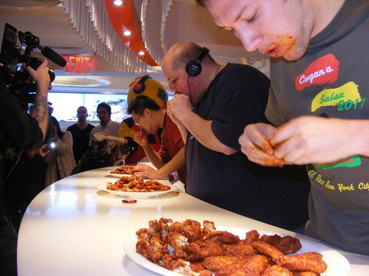 <a><img src="https://www.theepochtimes.com/assets/uploads/2015/09/DSCF6015.JPG" alt="WING EATERS: First-place winner Will Millender (C), second-place winner Derek O'Gall, and third-place winner Andrew Tsang (L) in the final round of the Kyochon hot wings eating contest held on Sunday at the chainâ��s Manhattan store on 32nd Street at Fifth Avenue. (Gidon Belmaker/The Epoch Times)" title="WING EATERS: First-place winner Will Millender (C), second-place winner Derek O'Gall, and third-place winner Andrew Tsang (L) in the final round of the Kyochon hot wings eating contest held on Sunday at the chainâ��s Manhattan store on 32nd Street at Fifth Avenue. (Gidon Belmaker/The Epoch Times)" width="320" class="size-medium wp-image-1806844"/></a>