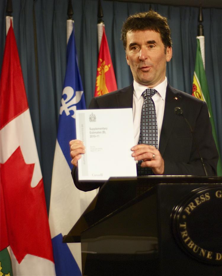 <a><img src="https://www.theepochtimes.com/assets/uploads/2015/09/DSC_0020.jpg" alt="NDP MP Paul Dewar holds up a copy of the most recent budget, saying MPs don't have enough support to evaluate the true costs of the programs and legislation they are debating. (Matthew Little/The Epoch Times)" title="NDP MP Paul Dewar holds up a copy of the most recent budget, saying MPs don't have enough support to evaluate the true costs of the programs and legislation they are debating. (Matthew Little/The Epoch Times)" width="320" class="size-medium wp-image-1811801"/></a>