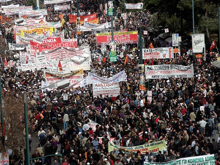 <a><img src="https://www.theepochtimes.com/assets/uploads/2015/09/GREECE97019510.jpg" alt="Crowds of people march through the streets during a 24-hour general strike on Feb. 24, in Athens, Greece. Greece ground to a halt and flights were grounded as unions staged a one-day general strike in protest against the Government's austerity measures designed to contain the massive public deficit. (Milos Bicanski/Getty Images)" title="Crowds of people march through the streets during a 24-hour general strike on Feb. 24, in Athens, Greece. Greece ground to a halt and flights were grounded as unions staged a one-day general strike in protest against the Government's austerity measures designed to contain the massive public deficit. (Milos Bicanski/Getty Images)" width="320" class="size-medium wp-image-1822664"/></a>