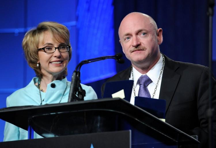 <a><img class="size-large wp-image-1772425" src="https://www.theepochtimes.com/assets/uploads/2015/09/Gabrielle+Giffords+and+Mark+Kelly-+145210367.jpg" alt="" width="590" height="406"/></a>