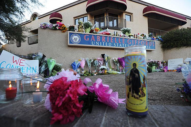 <a><img src="https://www.theepochtimes.com/assets/uploads/2015/09/Gabrielle_Giffords_107939303.jpg" alt="Gabrielle Giffords Alive: People leave flowers and candles outside the Tucson office of U.S. Rep. Gabrielle Giffords (D-AZ), who was shot during an event in front of a Safeway grocery store January 8, 2011 in Tuscon, Arizona. (Laura Segall/Getty Images)" title="Gabrielle Giffords Alive: People leave flowers and candles outside the Tucson office of U.S. Rep. Gabrielle Giffords (D-AZ), who was shot during an event in front of a Safeway grocery store January 8, 2011 in Tuscon, Arizona. (Laura Segall/Getty Images)" width="320" class="size-medium wp-image-1809941"/></a>