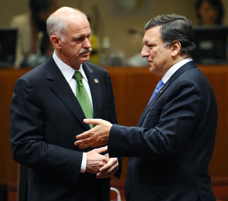 <a><img src="https://www.theepochtimes.com/assets/uploads/2015/09/Greece_PM.jpg" alt="Greek Prime Minister George A. Papandreou (L) talks with European Commission President Jose Manuel Barroso prior to a working session at an European Union summit at the European Council headquarters on Dec. 10 in Brussels. (JOHN THYS/AFP/Getty Images)" title="Greek Prime Minister George A. Papandreou (L) talks with European Commission President Jose Manuel Barroso prior to a working session at an European Union summit at the European Council headquarters on Dec. 10 in Brussels. (JOHN THYS/AFP/Getty Images)" width="320" class="size-medium wp-image-1824778"/></a>