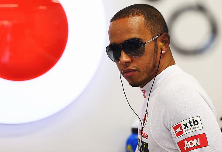 <a><img class="size-full wp-image-1781305" src="https://www.theepochtimes.com/assets/uploads/2015/09/HamTon152565130.jpg" alt="Lewis Hamilton prepares to drive during qualifying for the Formula One Singapore Grand Prix, September 22, 2012. 2012 will be Hamilton's last season with McLaren. (Robert Cianflone/Getty Images)" width="750" height="514"/></a>