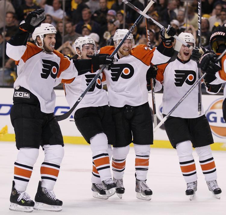 <a><img src="https://www.theepochtimes.com/assets/uploads/2015/09/Hockey99559527.jpg" alt="ORANGE CRUSH: The Philadelphia Flyers' victory over the Boston Bruins after losing the first three games of the series is one of the reasons hockey playoffs have been trumping basketball playoffs this year. (Elsa/Getty Images)" title="ORANGE CRUSH: The Philadelphia Flyers' victory over the Boston Bruins after losing the first three games of the series is one of the reasons hockey playoffs have been trumping basketball playoffs this year. (Elsa/Getty Images)" width="320" class="size-medium wp-image-1819758"/></a>