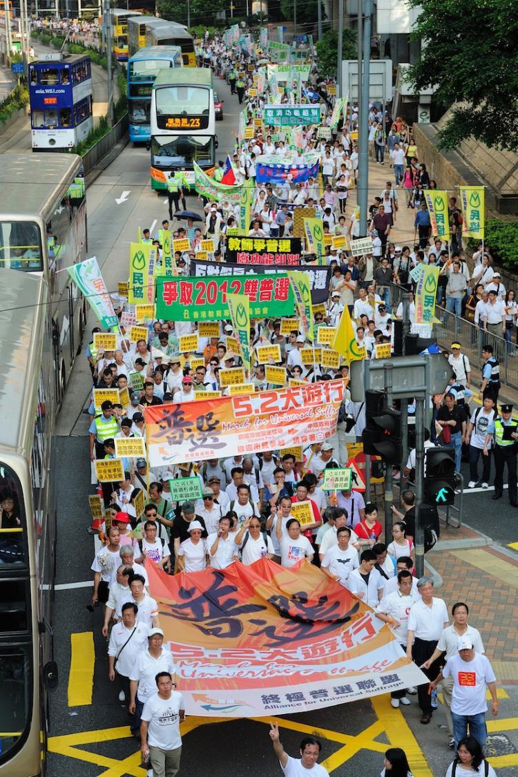 <a><img src="https://www.theepochtimes.com/assets/uploads/2015/09/Hong_Kong_1005021409281366.jpg" alt="Over 1000 protesters marched for freedom in Hong Kong on Sunday, as public discontent is brewing over Mainland's restriction on democratic governance.  (Win Hanlin/The Epoch Times)" title="Over 1000 protesters marched for freedom in Hong Kong on Sunday, as public discontent is brewing over Mainland's restriction on democratic governance.  (Win Hanlin/The Epoch Times)" width="320" class="size-medium wp-image-1820388"/></a>