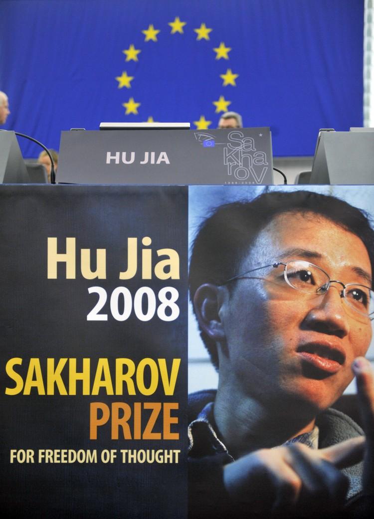 <a><img src="https://www.theepochtimes.com/assets/uploads/2015/09/HuJia91640642.jpg" alt="EMPTY SEAT: Jailed Chinese dissident Hu Jia's seat stands empty on Dec. 17, 2008, during the awards ceremony for the 2008 Sakharov Prize in the European Parliament. Hu was released from prison on Sunday after 3.5 years, but is not allowed to talk to media and supporters expect he will be closely monitored. (Dominique Faget/AFP/Getty Images)" title="EMPTY SEAT: Jailed Chinese dissident Hu Jia's seat stands empty on Dec. 17, 2008, during the awards ceremony for the 2008 Sakharov Prize in the European Parliament. Hu was released from prison on Sunday after 3.5 years, but is not allowed to talk to media and supporters expect he will be closely monitored. (Dominique Faget/AFP/Getty Images)" width="320" class="size-medium wp-image-1801937"/></a>