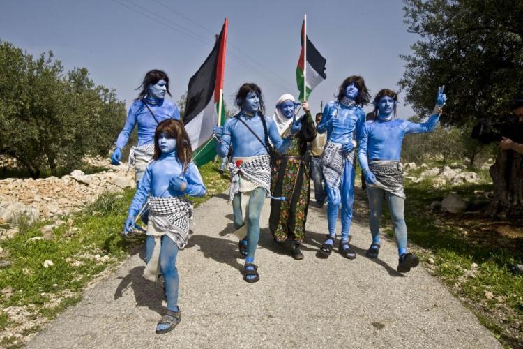 <a><img src="https://www.theepochtimes.com/assets/uploads/2015/09/ISRAEL-C.jpg" alt="Villagers of Bil'in together with Israeli and international activists dressed like the Na'vi characters from the movie 'Avatar', take part in the weekly demonstration against a security fence built by Israel near the village of Bilin on Feb. 12.  (Oren Ziv/AFP/Getty Images )" title="Villagers of Bil'in together with Israeli and international activists dressed like the Na'vi characters from the movie 'Avatar', take part in the weekly demonstration against a security fence built by Israel near the village of Bilin on Feb. 12.  (Oren Ziv/AFP/Getty Images )" width="320" class="size-medium wp-image-1823018"/></a>