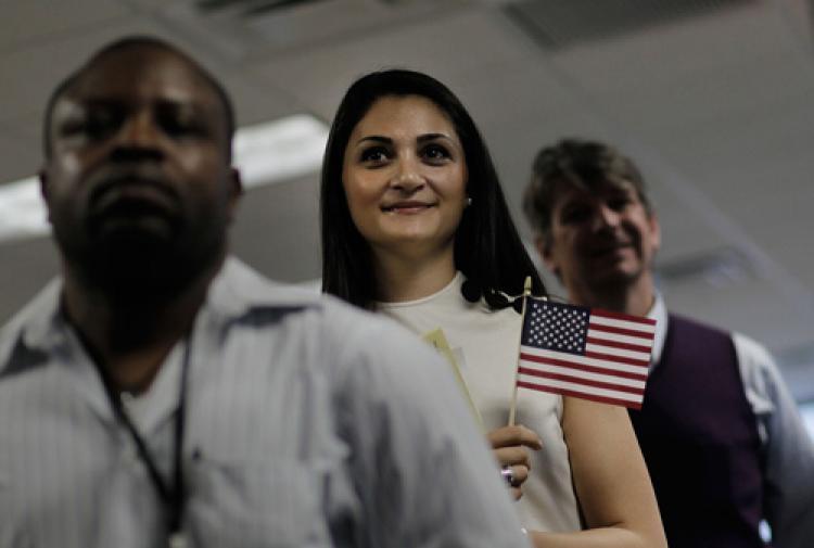 <a><img src="https://www.theepochtimes.com/assets/uploads/2015/09/Immigrant_99305559.jpg" alt="PRIDE OF CITIZENSHIP: Iveta Stephanopolous (C), originally from Armenia, holds an American flag during a naturalization ceremony at a U.S. Citizenship and Immigration Services office May 14, 2010 in New York City.  (Chris Hondros/Getty Images)" title="PRIDE OF CITIZENSHIP: Iveta Stephanopolous (C), originally from Armenia, holds an American flag during a naturalization ceremony at a U.S. Citizenship and Immigration Services office May 14, 2010 in New York City.  (Chris Hondros/Getty Images)" width="320" class="size-medium wp-image-1808947"/></a>