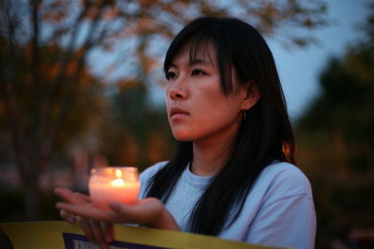 <a><img src="https://www.theepochtimes.com/assets/uploads/2015/09/JinPangDC20090730.jpg" alt="JIN PANG: In front of the Chinese embassy in Washington, D.C. protesting, July 30 for her mother's 7 year prison sentence by the Chinese communist regime for practicing Falun Gong. (John Yu/The Epoch Times)" title="JIN PANG: In front of the Chinese embassy in Washington, D.C. protesting, July 30 for her mother's 7 year prison sentence by the Chinese communist regime for practicing Falun Gong. (John Yu/The Epoch Times)" width="320" class="size-medium wp-image-1826990"/></a>