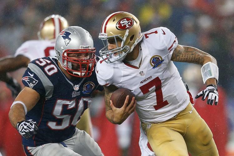 <a><img class="size-full wp-image-1773429" title="San Francisco 49ers v New England Patriots" src="https://www.theepochtimes.com/assets/uploads/2015/09/Kaepernick158452489.jpg" alt="Colin Kaepernick of the San Francisco 49ers evades Rob Ninkovich of the New England Patriots on Sunday, Dec. 16, 2012 at Gillette Stadium in Foxborough, Mass. (Jim Rogash/Getty Images)" width="750" height="500"/></a>