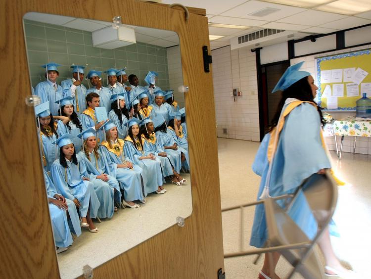 <a><img src="https://www.theepochtimes.com/assets/uploads/2015/09/Katrina-Affected-Schools.jpg" alt="Members of the 2008 graduating class of South Plaquemines High School wait for the start of their commencement May 21, 2008 in Boothville, La. South Plaquemines High School was formed in the aftermath of Hurricane Katrina by merging three destroyed high schools. (Mario Tama/Getty Images)" title="Members of the 2008 graduating class of South Plaquemines High School wait for the start of their commencement May 21, 2008 in Boothville, La. South Plaquemines High School was formed in the aftermath of Hurricane Katrina by merging three destroyed high schools. (Mario Tama/Getty Images)" width="320" class="size-medium wp-image-1815540"/></a>
