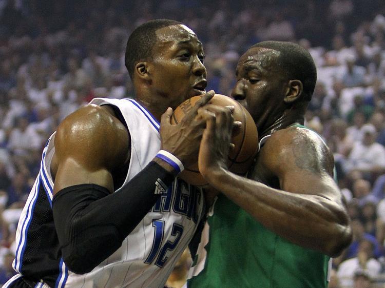 <a><img src="https://www.theepochtimes.com/assets/uploads/2015/09/Kelstsd99604525.jpg" alt="GROUNDED: Boston's Kendrick Perkins (right) played tough defense against Dwight Howard to keep Superman from soaring in Game 1. (Doug Benc/Getty Images)" title="GROUNDED: Boston's Kendrick Perkins (right) played tough defense against Dwight Howard to keep Superman from soaring in Game 1. (Doug Benc/Getty Images)" width="320" class="size-medium wp-image-1819837"/></a>