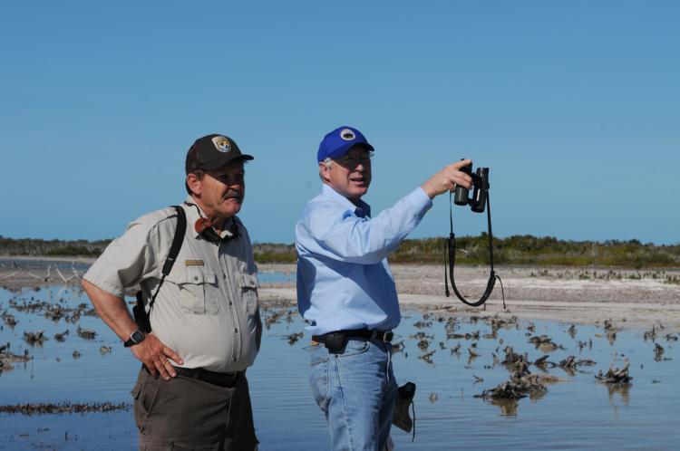 <a><img src="https://www.theepochtimes.com/assets/uploads/2015/09/KenSalazar_EverGlades.jpg" alt="RESTORING WETLANDS: Secretary of the Department of the Interior Ken Salazar seen touring the Florida Keys on Jan. 8 with a U.S. Fish and Wildlife Service agent by his side. Salazar announced that the U.S. Fish and Wildlife Service is working with private landowners, conservation groups, and federal, tribal, state, and local agencies to develop a new national wildlife refuge and conservation area.  (Courtesy of Tami Heilemann-DOI )" title="RESTORING WETLANDS: Secretary of the Department of the Interior Ken Salazar seen touring the Florida Keys on Jan. 8 with a U.S. Fish and Wildlife Service agent by his side. Salazar announced that the U.S. Fish and Wildlife Service is working with private landowners, conservation groups, and federal, tribal, state, and local agencies to develop a new national wildlife refuge and conservation area.  (Courtesy of Tami Heilemann-DOI )" width="320" class="size-medium wp-image-1809556"/></a>