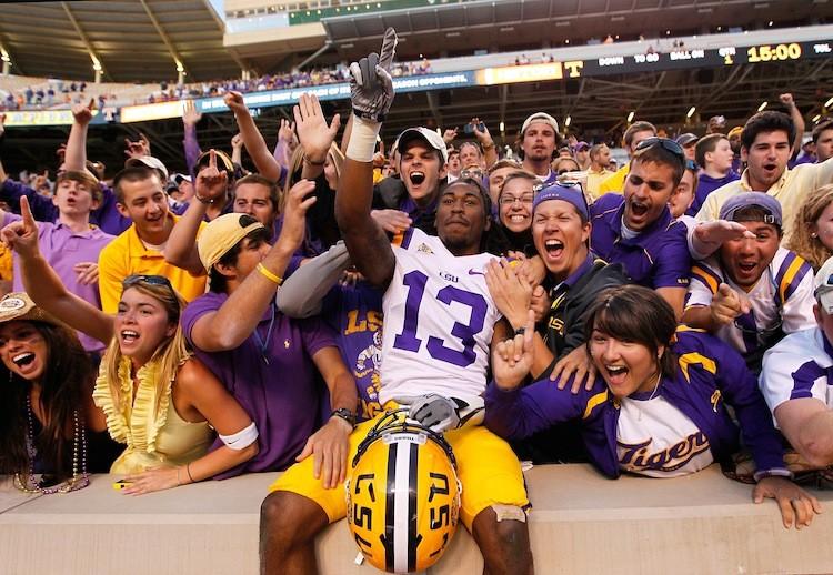 <a><img src="https://www.theepochtimes.com/assets/uploads/2015/09/LSU129279892.jpg" alt="Ron Brooks celebrates with fans after a 38-7 victory over Tennessee on Saturday. LSU claimed the top spot in the first BCS poll of the season on Sunday. (Kevin C. Cox/Getty Images)" title="Ron Brooks celebrates with fans after a 38-7 victory over Tennessee on Saturday. LSU claimed the top spot in the first BCS poll of the season on Sunday. (Kevin C. Cox/Getty Images)" width="575" class="size-medium wp-image-1796238"/></a>