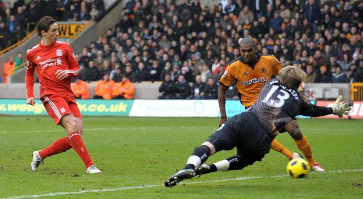 <a><img src="https://www.theepochtimes.com/assets/uploads/2015/09/Liverpool108243137.jpg" alt="Liverpool's Fernando Torres scores the opening goal of the game at Wolves on Saturday. (Andrew Yates/AFP/Getty Images)" title="Liverpool's Fernando Torres scores the opening goal of the game at Wolves on Saturday. (Andrew Yates/AFP/Getty Images)" width="320" class="size-medium wp-image-1809344"/></a>