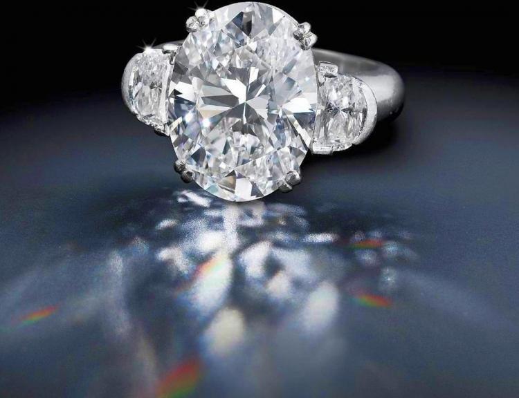 <a><img src="https://www.theepochtimes.com/assets/uploads/2015/09/Lot149Ring.jpg" alt="DIAMOND SOLITAIRE RING: The oval-shaped diamond, weighing 10.17 carats, with half-moon diamond shoulders; mounted in platinum; size 6. Estimate: $550,000 - 650,000 (Courtesy of Bonhams New York)" title="DIAMOND SOLITAIRE RING: The oval-shaped diamond, weighing 10.17 carats, with half-moon diamond shoulders; mounted in platinum; size 6. Estimate: $550,000 - 650,000 (Courtesy of Bonhams New York)" width="320" class="size-medium wp-image-1824806"/></a>