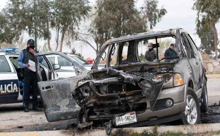<a><img src="https://www.theepochtimes.com/assets/uploads/2015/09/MEXICO.jpg" alt="Members of the Mexican Federal Police guard found on March 15 a burnt out SUV on the outskirts of Ciudad Juarez, which is apparently linked to the attack on US consular staff the past weekend. (Jesus Alcazar/AFP/Getty Images)" title="Members of the Mexican Federal Police guard found on March 15 a burnt out SUV on the outskirts of Ciudad Juarez, which is apparently linked to the attack on US consular staff the past weekend. (Jesus Alcazar/AFP/Getty Images)" width="320" class="size-medium wp-image-1822068"/></a>