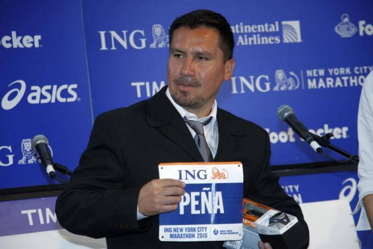 <a><img src="https://www.theepochtimes.com/assets/uploads/2015/09/MG_0742.jpg" alt="Edison 'the runner' Pena ran through tunnels when he was trapped in a Chilean mine. He received his official race bib Thursday for the annual ING New York Marathon on Sunday.  (Lixin Shi/The Epoch Times)" title="Edison 'the runner' Pena ran through tunnels when he was trapped in a Chilean mine. He received his official race bib Thursday for the annual ING New York Marathon on Sunday.  (Lixin Shi/The Epoch Times)" width="320" class="size-medium wp-image-1812576"/></a>