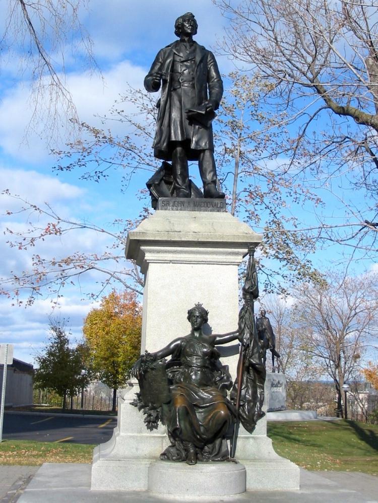 <a><img src="https://www.theepochtimes.com/assets/uploads/2015/09/MacDonald_statue_Ottawa.jpg" alt="A statue of Sir John A. Macdonald, Canada's founding prime minister stands on Parliament Hill in Ottawa just in front of some of the best parking in the neighbourhood. (Flicker user Neil Carey, Nov. 3, 2002)" title="A statue of Sir John A. Macdonald, Canada's founding prime minister stands on Parliament Hill in Ottawa just in front of some of the best parking in the neighbourhood. (Flicker user Neil Carey, Nov. 3, 2002)" width="320" class="size-medium wp-image-1816277"/></a>