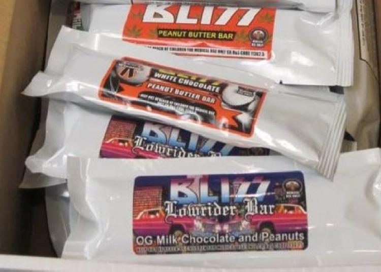 <a><img src="https://www.theepochtimes.com/assets/uploads/2015/09/Marijuana_candy_2.jpg" alt="A box of 'Blitz' brand candy bars laced with marijuana and hashish oil seized during a recent raid. (Photo courtesy of Los Angeles County Sheriff's Department)" title="A box of 'Blitz' brand candy bars laced with marijuana and hashish oil seized during a recent raid. (Photo courtesy of Los Angeles County Sheriff's Department)" width="320" class="size-medium wp-image-1813609"/></a>