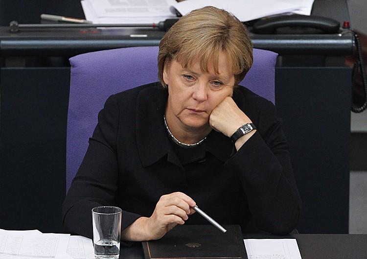 <a><img src="https://www.theepochtimes.com/assets/uploads/2015/09/Merkel.jpg" alt="German Chancellor Angela Merkel is seen during debates over the federal budget at the Bundestag on Sept. 7, in Berlin. Europe is embroiled in a sovereign debt crisis that is testing the eurozone's unity in times of economic peril. (Sean Gallup/Getty Images)" title="German Chancellor Angela Merkel is seen during debates over the federal budget at the Bundestag on Sept. 7, in Berlin. Europe is embroiled in a sovereign debt crisis that is testing the eurozone's unity in times of economic peril. (Sean Gallup/Getty Images)" width="320" class="size-medium wp-image-1797965"/></a>